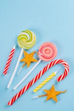 Lolipops on blue background Stock Photos