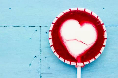 Lollipop on blue Stock Photos