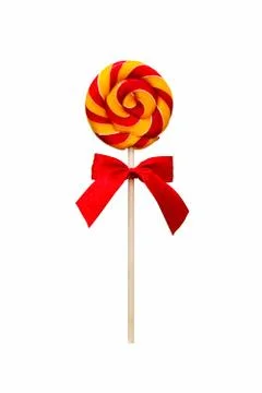Lollipop candy, round shape and colorful curls. Holiday sweets for children 스톡 사진