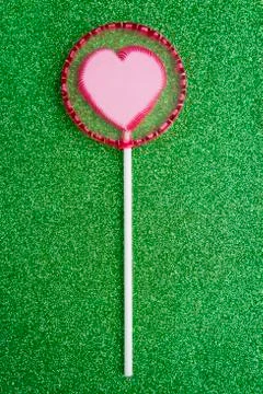Lollipop on glitter Stock Photos