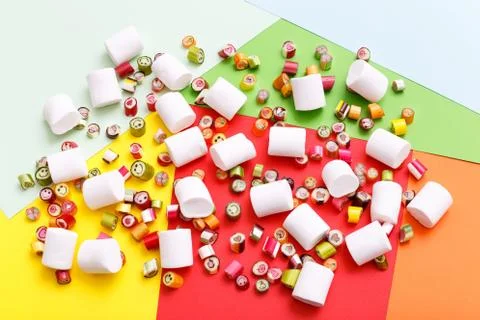 Lollipops, candy pattern, top view flat lay on colorful background Stock Photos