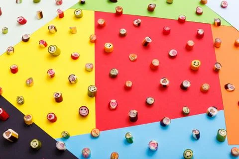 Lollipops, candy pattern, top view flat lay on colorful background Stock Photos