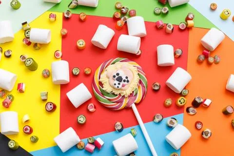 Lollipops, candy pattern, top view flat lay on colorful background Stock Photos