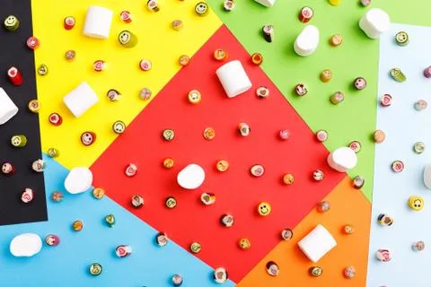 Lollipops, candy pattern, top view flat lay on colorful background Stock Photos