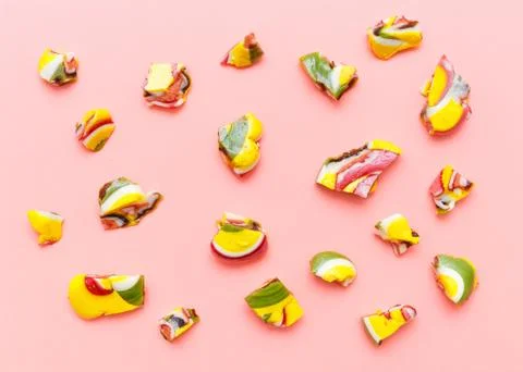 Lollipops, candy pattern, top view flat lay on colorful background Stock Photos