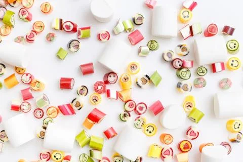 Lollipops, candy pattern, top view flat lay on colorful background Stock Photos