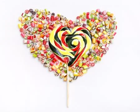 Lollipops, candy pattern, top view flat lay on colorful background Stock Photos