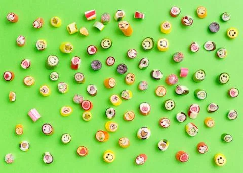 Lollipops, candy pattern, top view flat lay on colorful background Stock Photos