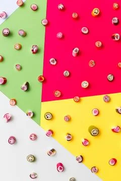 Lollipops, candy pattern, top view flat lay on colorful background Stock Photos