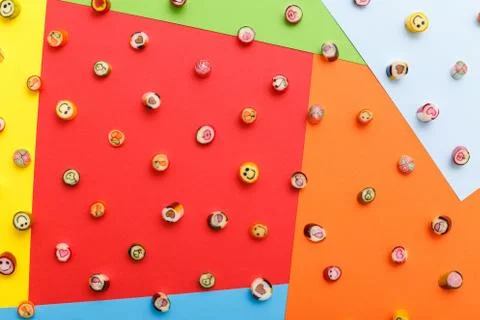 Lollipops, candy pattern, top view flat lay on colorful background Stock Photos