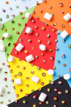 Lollipops, candy pattern, top view flat lay on colorful background Stock Photos