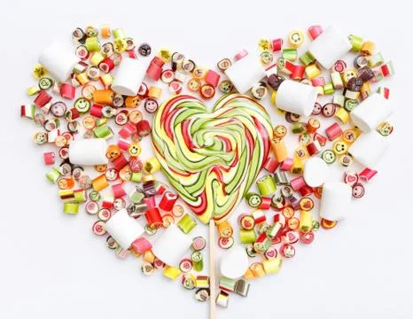 Lollipops, candy pattern, top view flat lay on colorful background Stock Photos