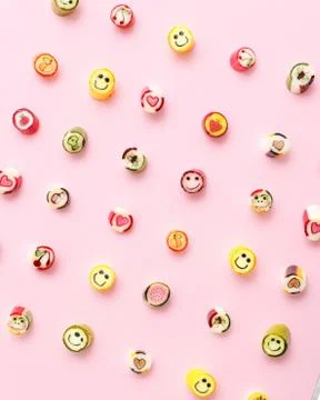 Lollipops, candy pattern, top view flat lay on colorful background Stock Photos