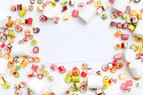 Lollipops, candy pattern, top view flat lay on colorful background Stock Photos