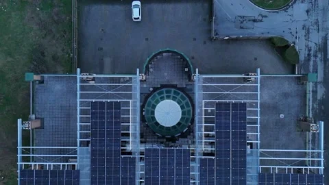 Lombardy Italy multi-storey building solar panel array rooftop renewable en.. Stock Footage 325727783