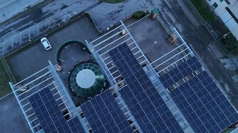 Lombardy Italy multi-storey building solar panel array rooftop renewable en.. Stock Footage 325840840