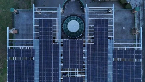 Lombardy Italy multi-storey building solar panel array rooftop renewable en.. Stock Footage 325840873