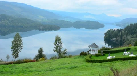 Lomen Norway beautiful reflections on setting at resort on water called Marit Vídeo Stock 47341145