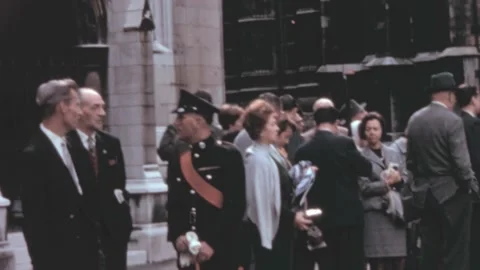 London - 1964: Queue of tourists wait in front of entrance info sights Stock Footage 166779217