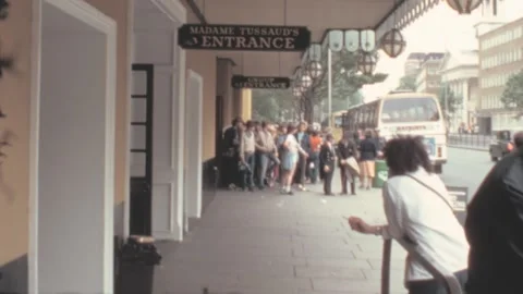 London - 1983: visitors queue in front of Madame Tussaud's museum entrance Stock Footage 239537847