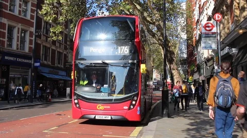 A London bus stops Stock Footage 96271217