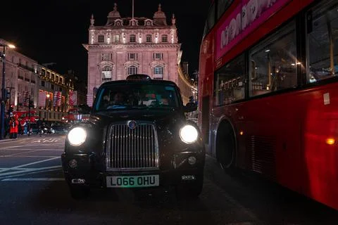 London cab front view. Classical taxi cab in London. Stock Photos