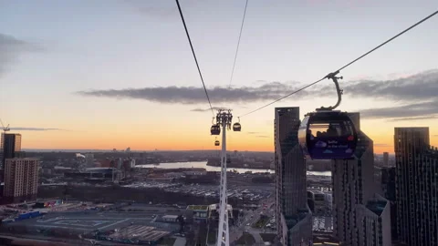 London Cable Car Over Thames River At Sunset With Skyline Views Stock Footage 328580311