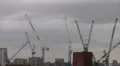 London City Building Under Construction Site Cranes Silhouettes Moving Cloudy HD Footage