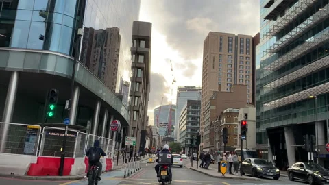 London City. Pulling lights, driving shot. Daytime. Video stock 220104428