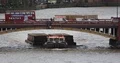 London with Container Ship Transport on Thames River and Cars Traffic on Bridge 4k or 4k+ Resolution