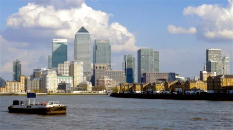 London Docklands skyline and the River Thames, England Stock Footage