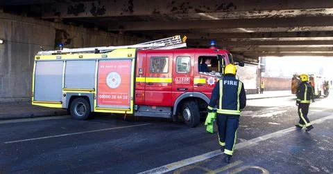 London Fire Brigade Fire Engine with Firefighters. Stock Photos