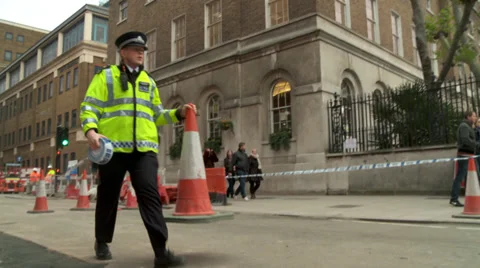 London fire engine arrives on site, police sealing area Stock Footage 33446234