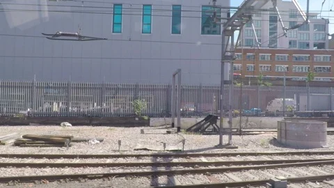 LONDON - JULY 2017: Point of view of passenger from window cabin train arrivi Stock Footage 85762003