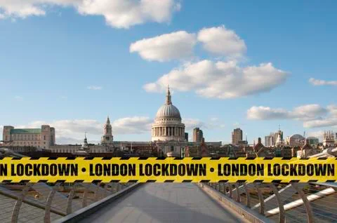 London lockdown concept: an empty millennium bridge and St. Paul cathedral Stock Photos