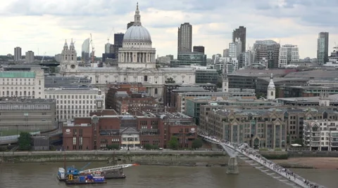 London Looking over River Thames, The Millennium Bridge and St Paul's Cathedral Stock Footage 66029312