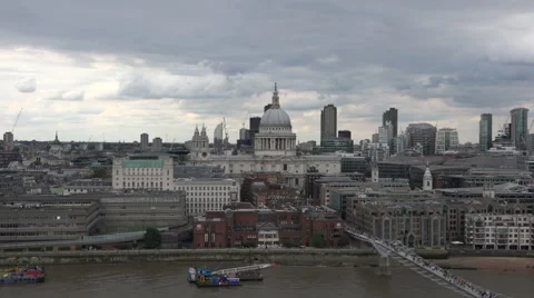 London Looking over River Thames, The Millennium Bridge and St Paul's Cathedral Stock Footage 66029414