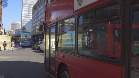 London, Red Bus Passing Stock Footage 73972960