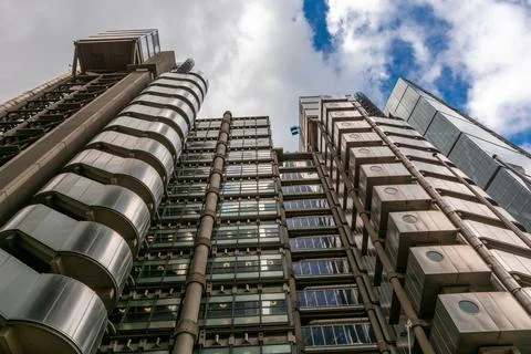London, reflection of clouds in the windows of modern buildings Stock Photos