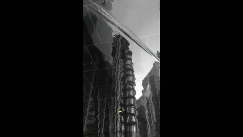 London reflection of lloyds building in a puddle Stock Footage 135179115