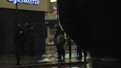 LONDON RIOT SMASHED WINDOW Stock Footage 149574902