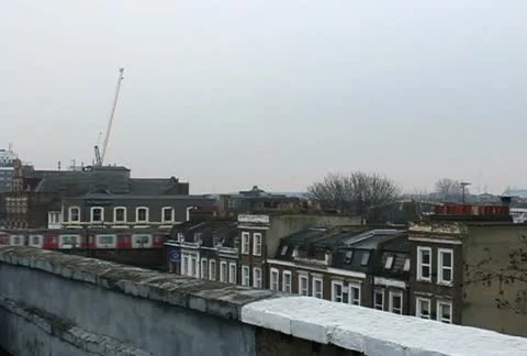 London Rooftops with subway train passing NTSC Sd Stock Footage 10794229