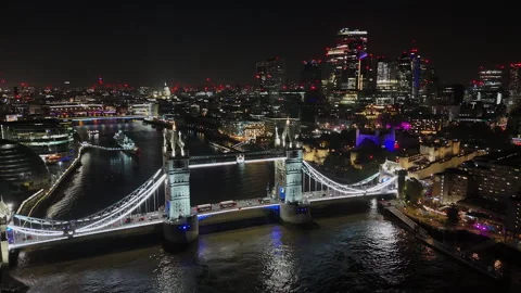 London Skyline and Tower Bridge at Night  Aerial View Stock Footage 346089134