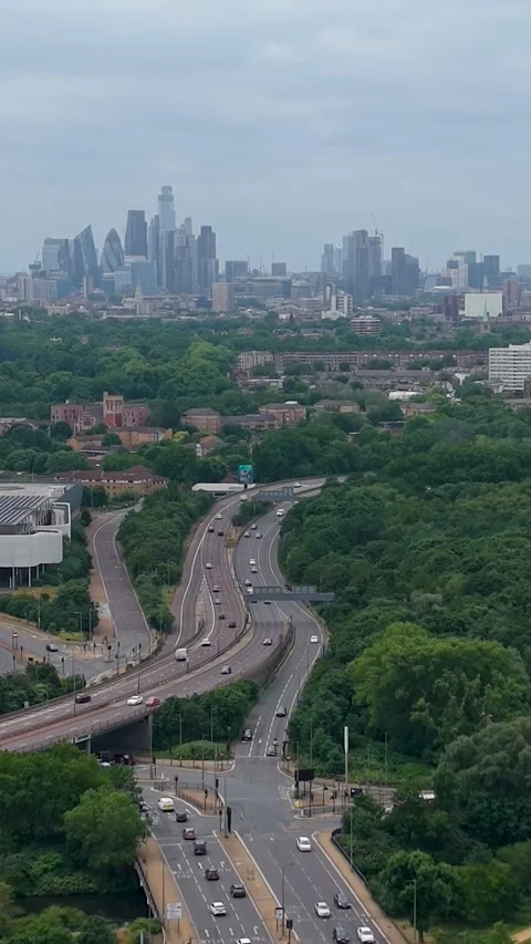 London skyline drone pullback revealing the Shard, Gherkin and BT Tower above Stock Footage 337405804