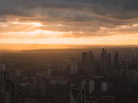 London Skyline at Sunset with Dramatic Clouds and Skyscrapers Stock Photos