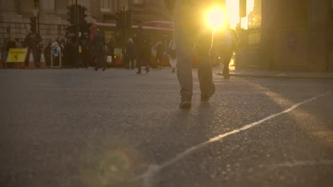 London street crowd busy evening golden hour Stock Footage