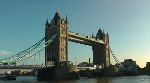 London Tower Bridge Red Bus river boat wintry sky Stock Footage 46791952