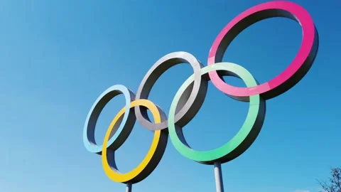 LONDON, UK - April 10th 2019: The Olympic games sign under a blue sky Stock Footage 141018565