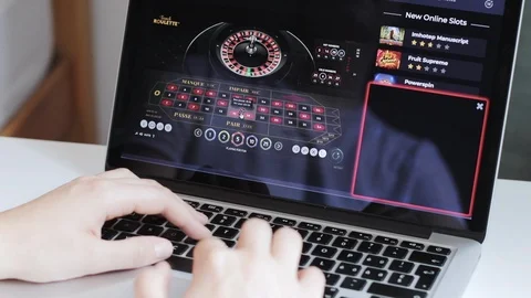 London / UK - August 10th 2019 - Online gambling on a laptop Stock Footage
