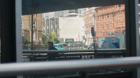 London, UK - Circa 2018: Reflection of London bus and taxis on Old Street Video stock 128779734